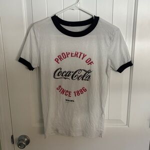 Coca-Cola White Tee with Black Trim and Red Text